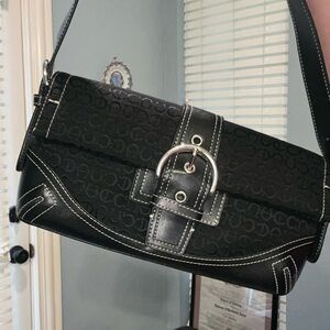 Black shoulder clutch new without tags. No brand.